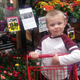 Ashley’s son helping her at work, before the pandemic.